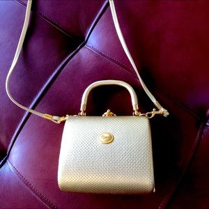 Cawen’s gold, pill box purse